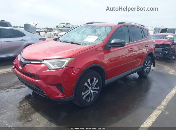JTMZFREV0GJ088793 2016 TOYOTA LE Красный Передняя левая четверть