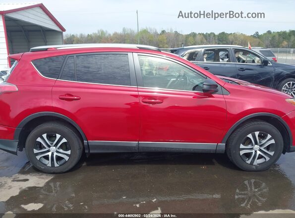 JTMZFREV0GJ088793 2016 TOYOTA LE Красный Вид задней части салона