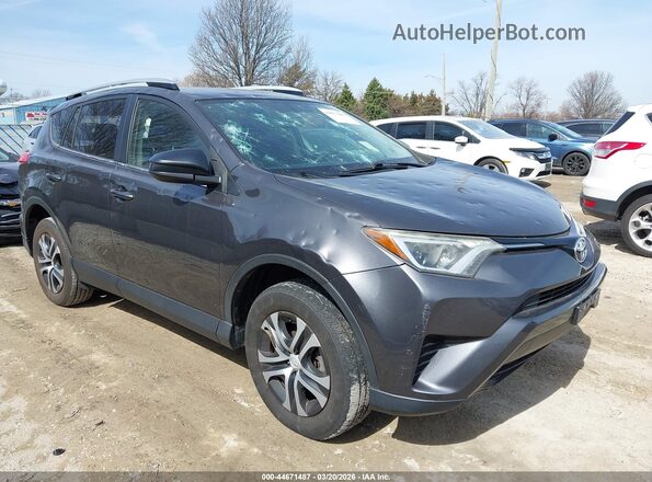 JTMZFREV4GJ080647 2016 TOYOTA LE Gray Front right