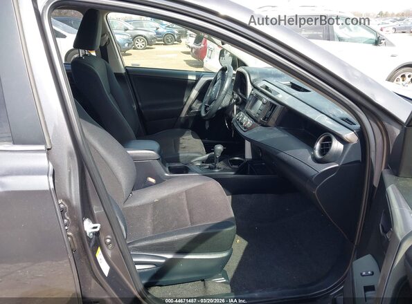 JTMZFREV4GJ080647 2016 TOYOTA LE Gray Front interior view