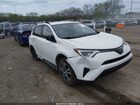 2018 Toyota Rav4 Le White vin: JTMZFREVXJJ739001