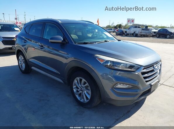 KM8J33A44JU667979 2018 HYUNDAI TUCSON Серый Передняя правая четверть