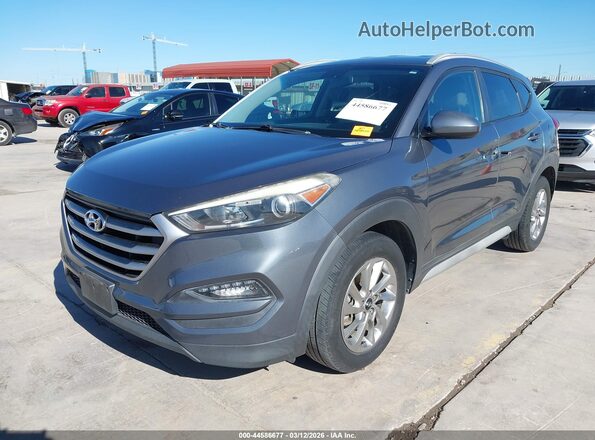 KM8J33A44JU667979 2018 HYUNDAI TUCSON Серый Передняя левая четверть