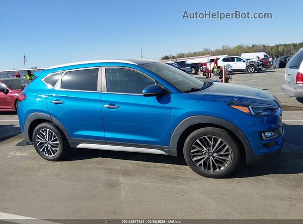 KM8J33ALXMU325738 2021 HYUNDAI TUCSON Blue Widok wnętrza z tyłu
