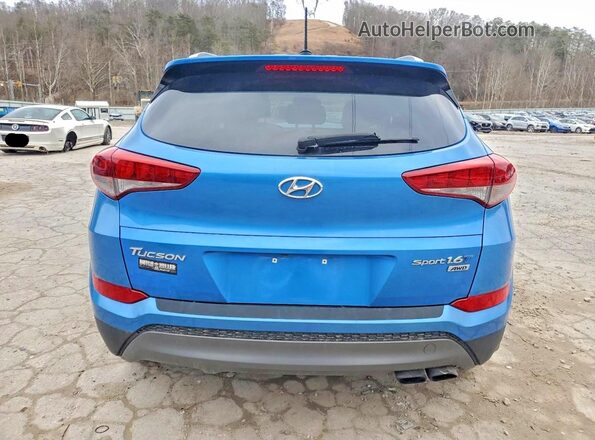 KM8J3CA25GU229253 2016 HYUNDAI TUCSON Blue Widok z tyłu