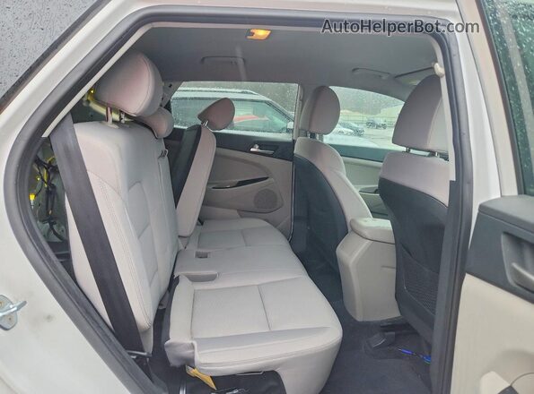 KM8J3CA46KU073069 2019 HYUNDAI TUCSON White Vista interior trasera
