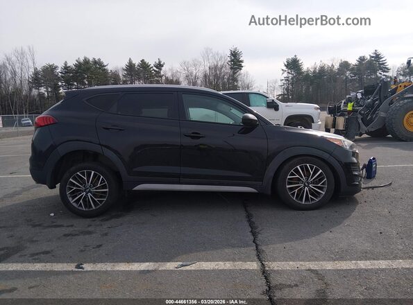 KM8J3CAL5LU183815 2020 HYUNDAI TUCSON Black Widok wnętrza z tyłu