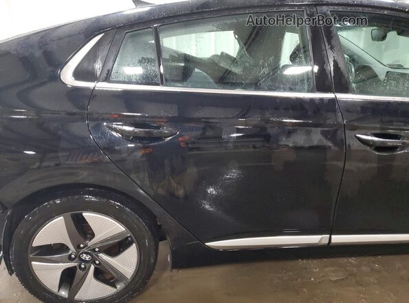 KMHC85LCXMU245083 2021 HYUNDAI IONIQ Black Вид задніх сидінь