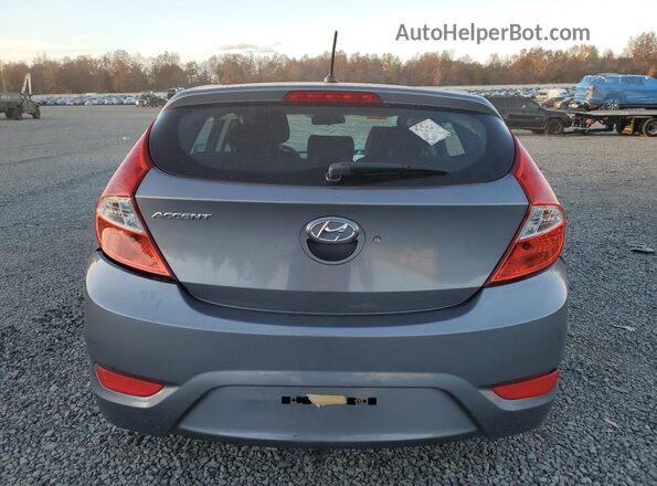 KMHCT5AEXHU343135 2017 HYUNDAI ACCENT Серый Вид сзади