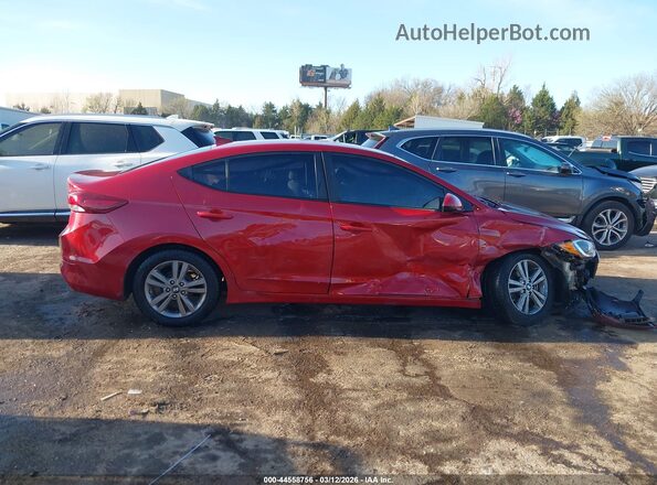 KMHD84LF3HU085059 2017 HYUNDAI ELANTRA Red Widok wnętrza z tyłu