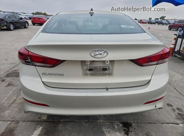 KMHD84LFXJU638327 2018 HYUNDAI ELANTRA Beige Vista trasera
