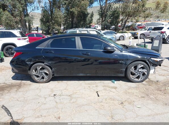 KMHLS4DG4RU652871 2024 HYUNDAI ELANTRA Черный Вид задней части салона
