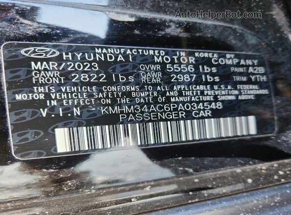 KMHM34AC6PA034548 2023 HYUNDAI IONIQ Черный Вид подкапотного пространства