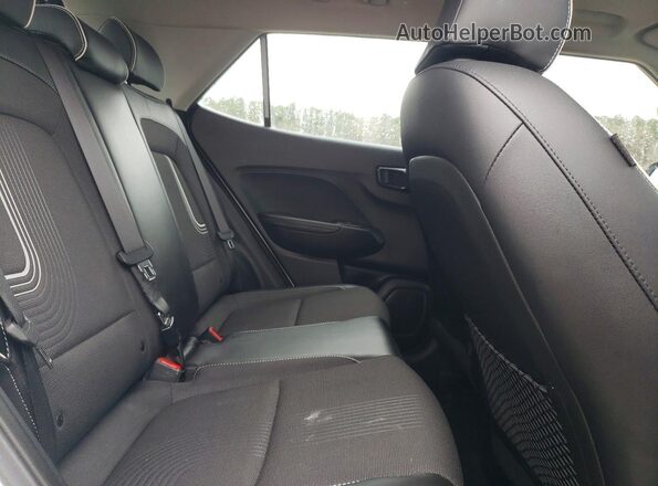 KMHRC8A38PU223844 2023 HYUNDAI VENUE Белый Вид задней части салона