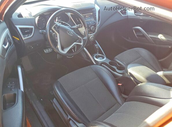 KMHTC6AD1GU283869 2016 HYUNDAI VELOSTER Оранжевый Вид панели приборов