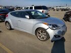 2016 Hyundai Veloster Base Серебряный vin: KMHTC6AD4GU266063
