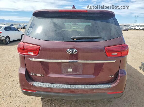 KNDMB5C11K6505753 2019 KIA SEDONA Maroon Vista trasera