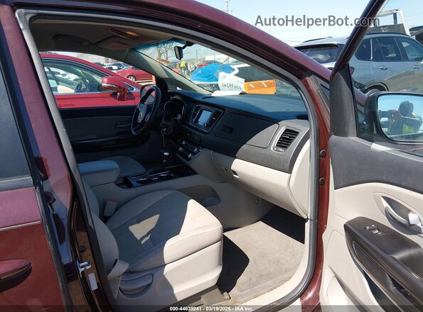 KNDMB5C14K6533501 2019 KIA SEDONA Maroon წინა სალონის ხედი