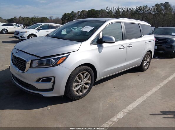 KNDMB5C15K6506114 2019 KIA SEDONA Серебряный Передняя левая четверть