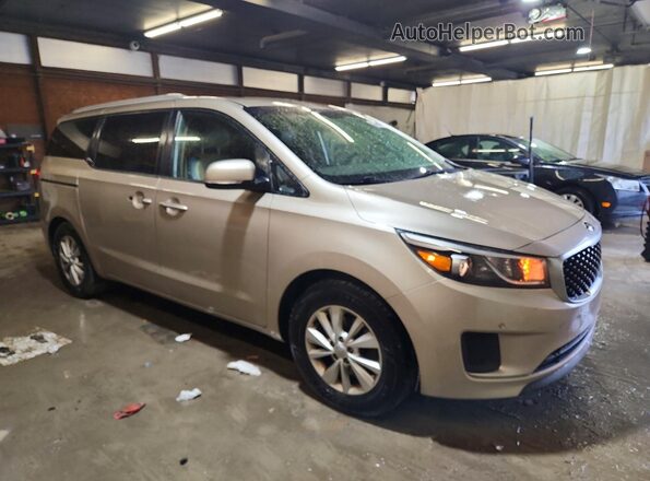 KNDMB5C16H6279802 2017 KIA SEDONA Золотой Вид спереди