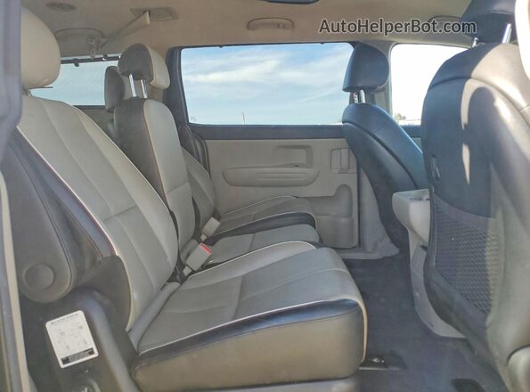 KNDMB5C17K6532780 2019 KIA SEDONA Gray Rear interior view
