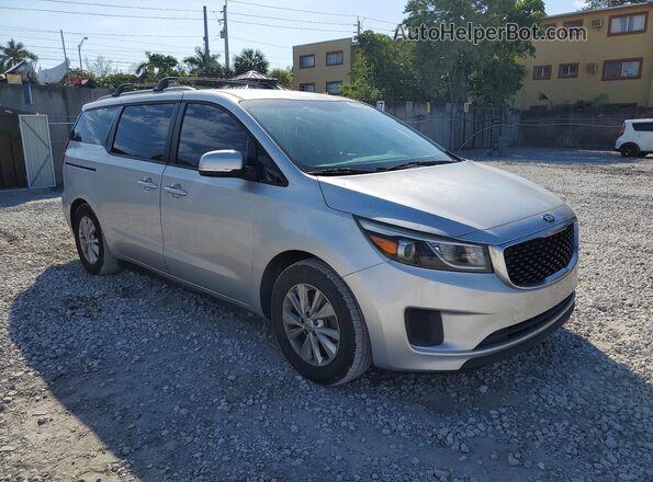 KNDMB5C1XG6179796 2016 KIA SEDONA Серебряный Передняя правая четверть