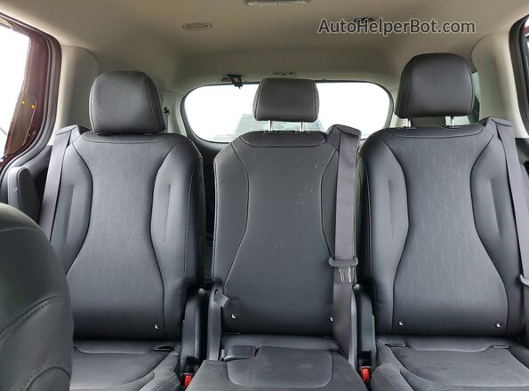 KNDNB4H35R6401110 2024 KIA CARNIVAL Темно-бордовый Вид задних сидений