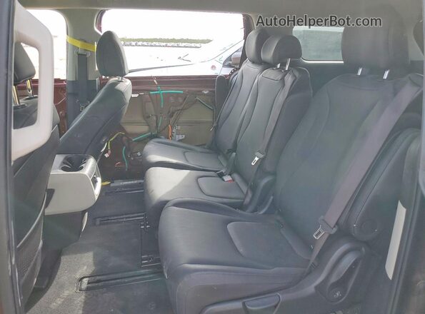 KNDNB4H35R6401110 2024 KIA CARNIVAL Темно-бордовый Вид задней части салона