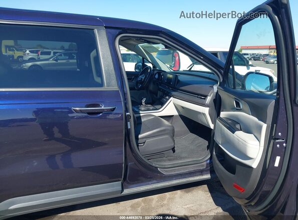 KNDNB4H36R6311657 2024 KIA CARNIVAL MPV Blue Widok wnętrza z przodu