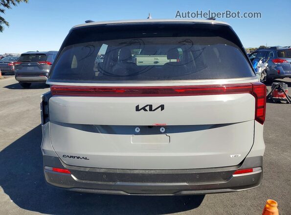 KNDNE5KA8S6079024 2025 KIA CARNIVAL Серый Вид сзади