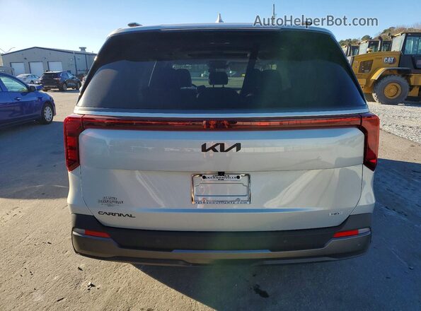 KNDNE5KA9S6049286 2025 KIA CARNIVAL Серебряный Вид сзади