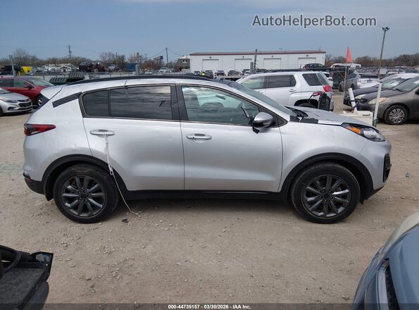 KNDP6CAC1M7851566 2021 KIA SPORTAGE Серебряный Вид задней части салона