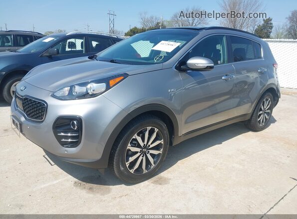 KNDPNCAC2K7567492 2019 KIA SPORTAGE Серебряный Передняя левая четверть
