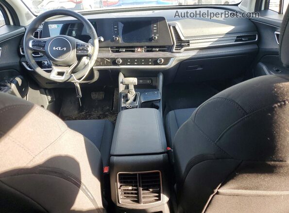 KNDPUCDF7S7352909 2025 KIA SPORTAGE Белый Вид панели приборов