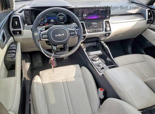 KNDRKDLG8P5209324 2023 KIA SORENTO Серебряный Вид панели приборов