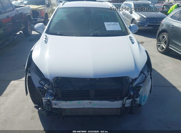 LRBFXESX9GD245006 2016 BUICK ENVISION Белый Вид задней части салона