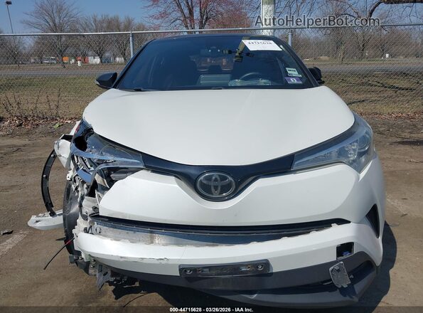 NMTKHMBX0KR097959 2019 TOYOTA LE White ხელსაწყოთა პანელის ხედი
