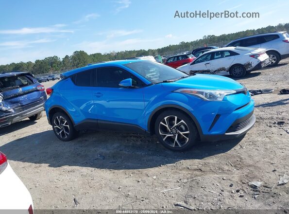 NMTKHMBX8KR072002 2019 TOYOTA LE Blue Widok wnętrza z tyłu