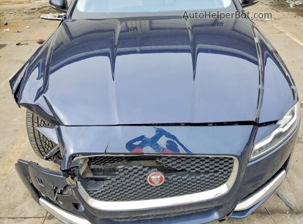 SAJBJ4BV9GCY16687 2016 JAGUAR XF Синий Вид задней части салона