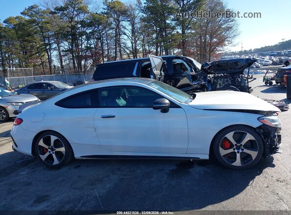 W1KWJ6EBXMG064523 2021 MERCEDES-BENZ AMG C 43 White Widok wnętrza z tyłu