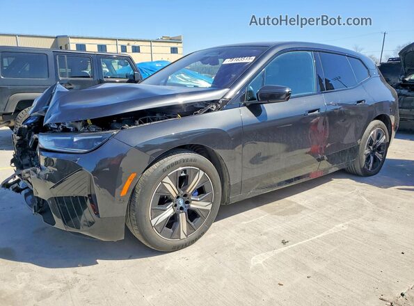 WB523CF00RCR54506 2024 BMW IX Черный Передняя левая четверть