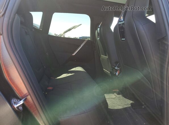 WB523CF00RCR54506 2024 BMW IX Черный Вид задней части салона