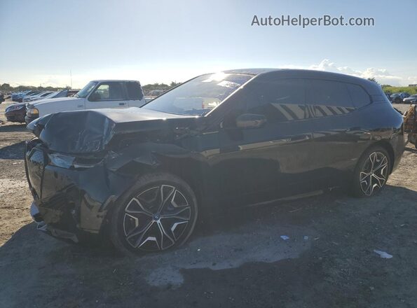 WB523CF02SCT46332 2025 BMW IX Black Vista tres cuartos delantera izquierda