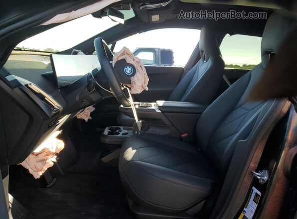 WB523CF02SCT46332 2025 BMW IX Black Vista interior delantera