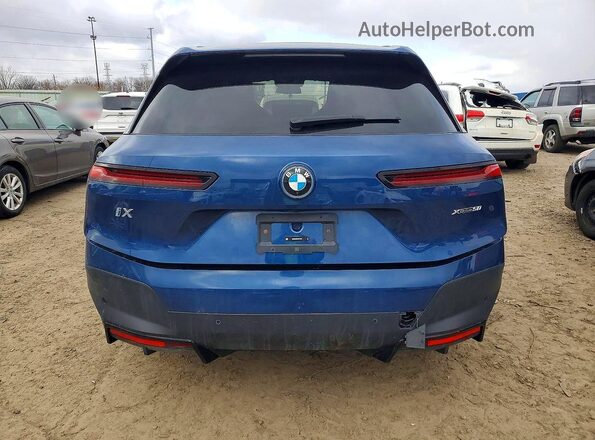 WB523CF03RCR10807 2024 BMW IX Blue უკანა ხედი