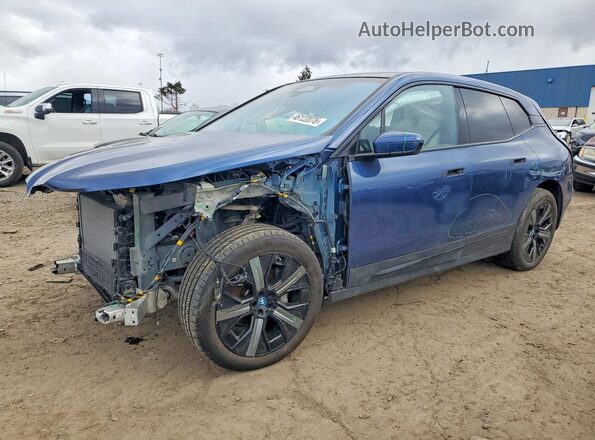 WB523CF03RCR10807 2024 BMW IX Blue წინა მარცხენა ხედი სამი მეოთხედიდან