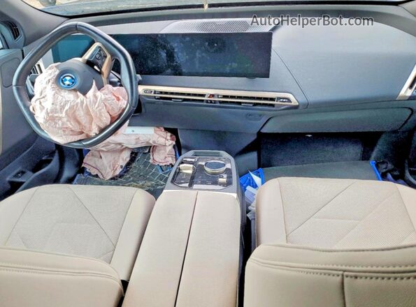 WB523CF03RCR10807 2024 BMW IX Blue წინა პანელის ხედი