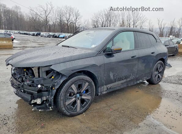 WB523CF06RCR64893 2024 BMW IX Черный Передняя левая четверть