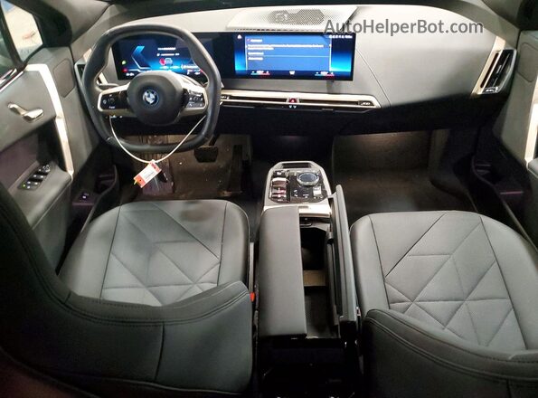 WB523CF07PCM04989 2023 BMW IX Blue Widok deski rozdzielczej
