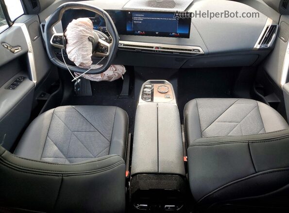 WB523CF09PCL65340 2023 BMW IX Black Vista del salpicadero